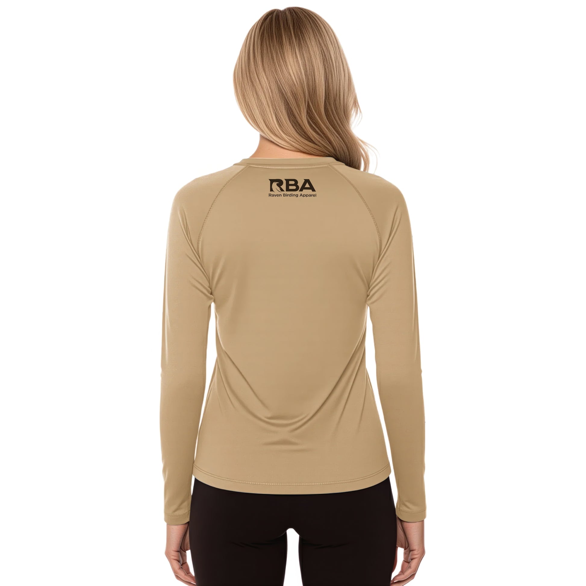 Person wearing a beige long-sleeve shirt with 'RBA' logo on the back against a white background