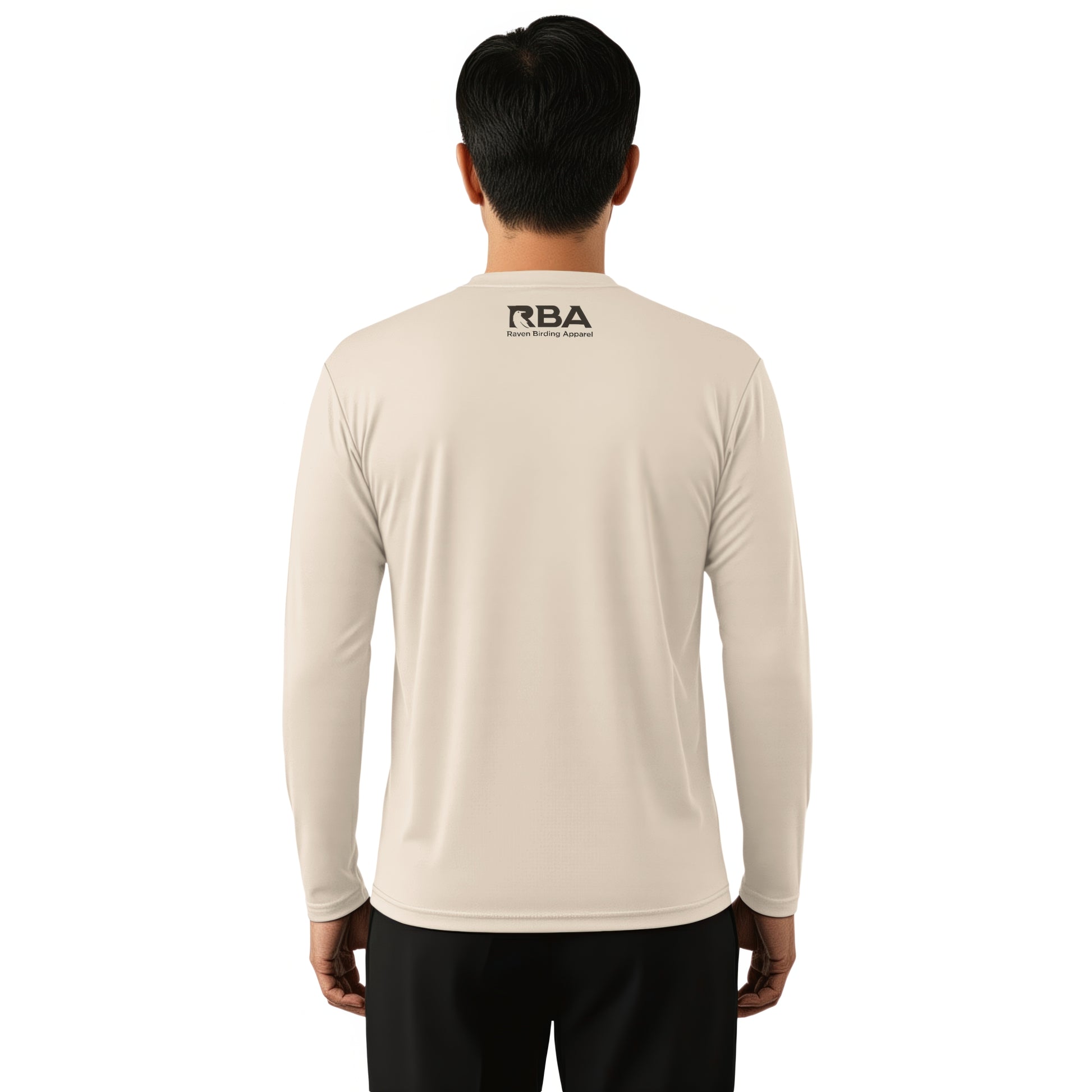 Person wearing a beige long-sleeve shirt with 'RBA' logo on the back against a white background