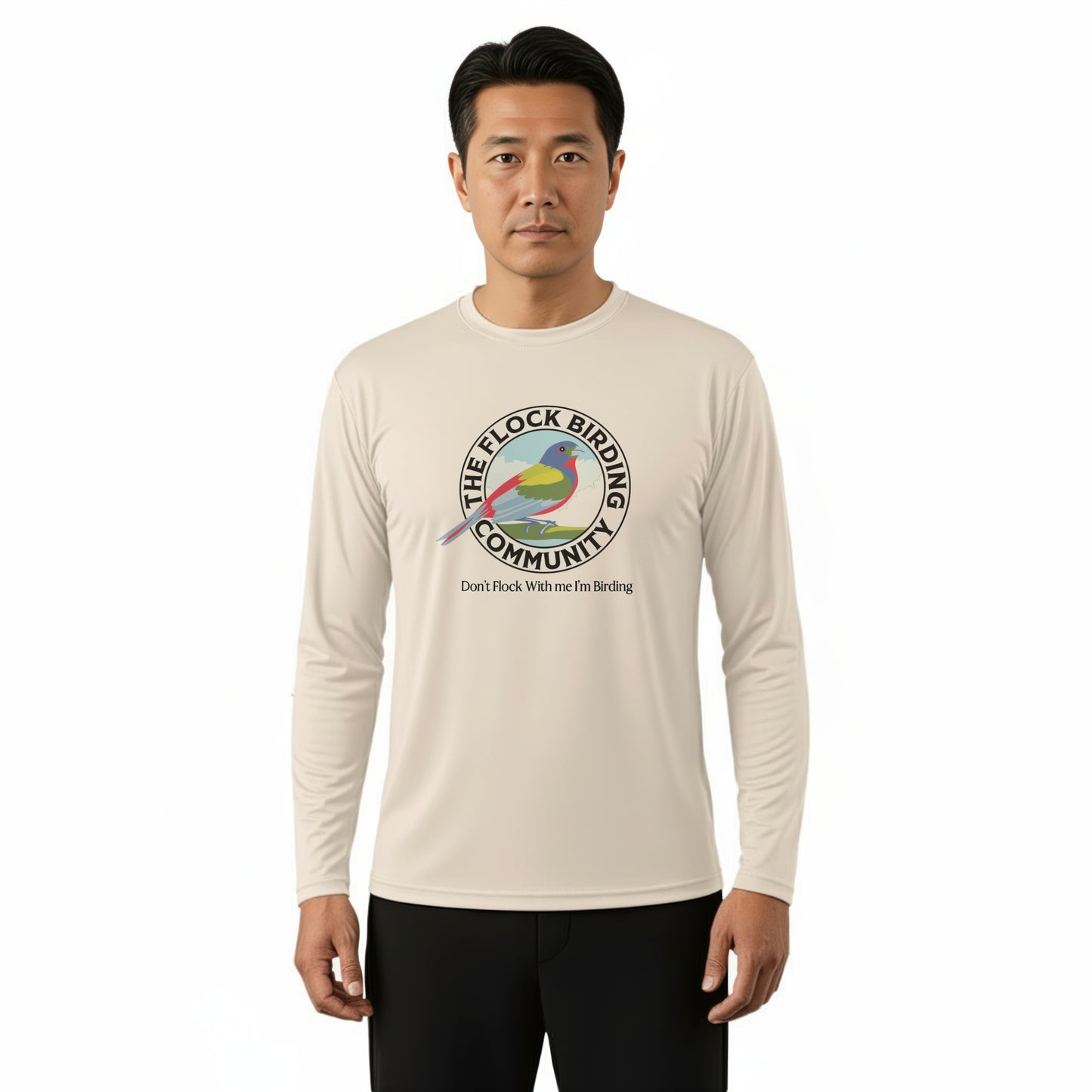 Man wearing a beige long-sleeve shirt with a bird-themed graphic and text on a white background
