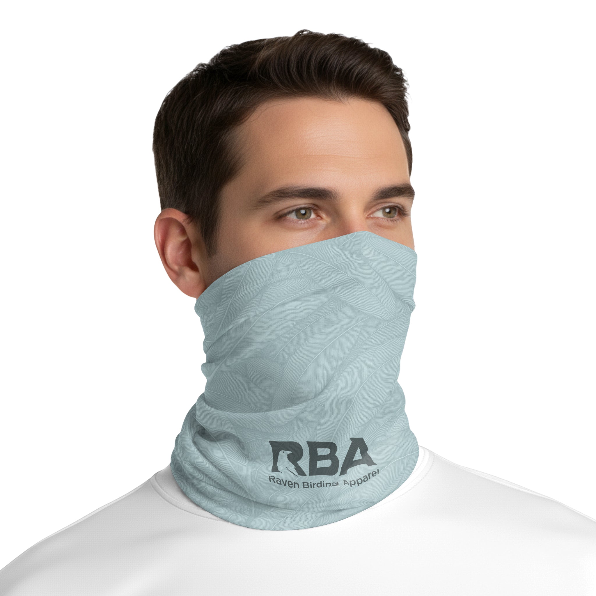 Man wearing a Weathered Slate neck gaiter with a Raven Birding Apparel logo.