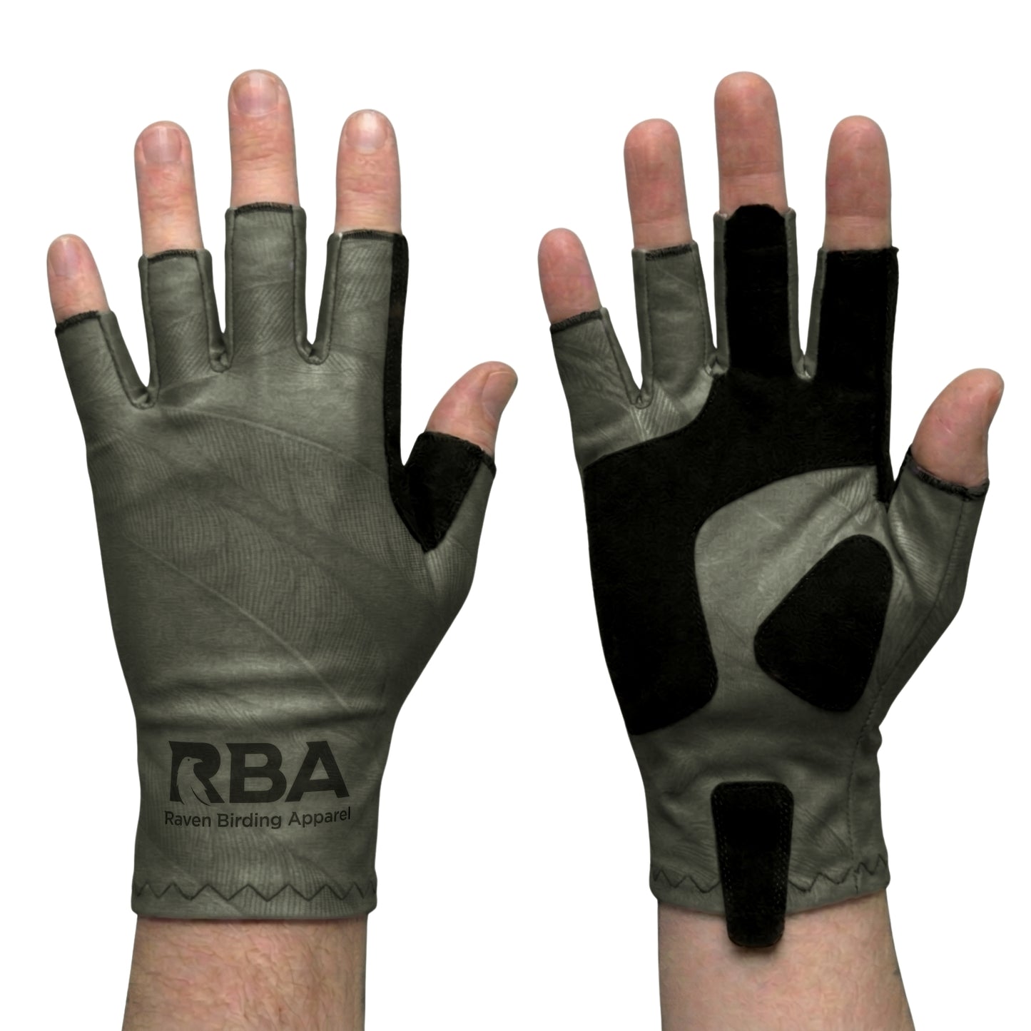 A pair of fingerless gloves worn on hands, showing both the back of one glove and the palm/underside of the other. The gloves are olive green with black grip panels and wrist branding that reads RBA Seven Binding Apparel.