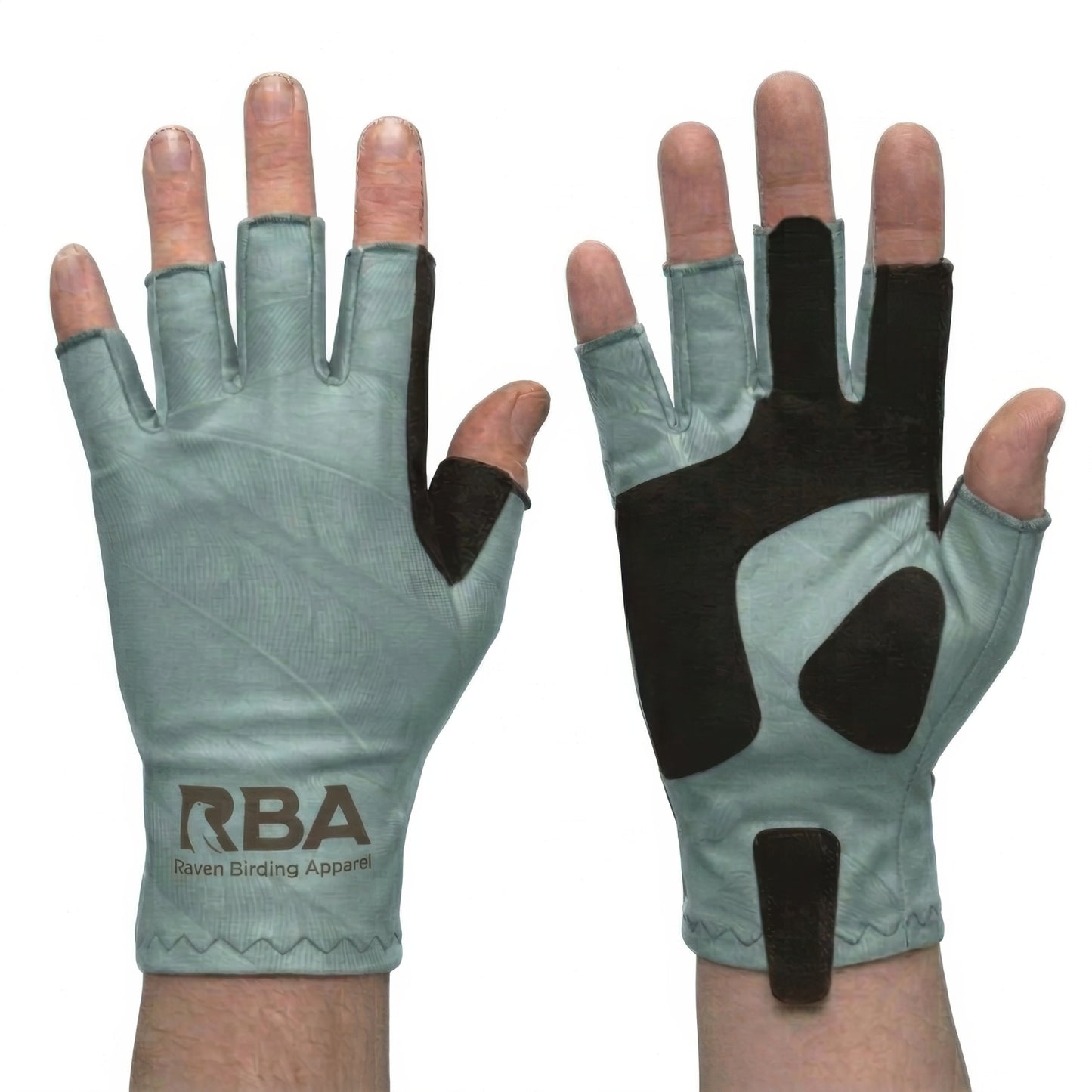 A pair of fingerless gloves shown on hands, displaying both the front and back views. The gloves are a muted sage green color with black grip panels on the backs and fingers, and feature the 'RBA Seven Binding Apparel' logo on the back of one glove.