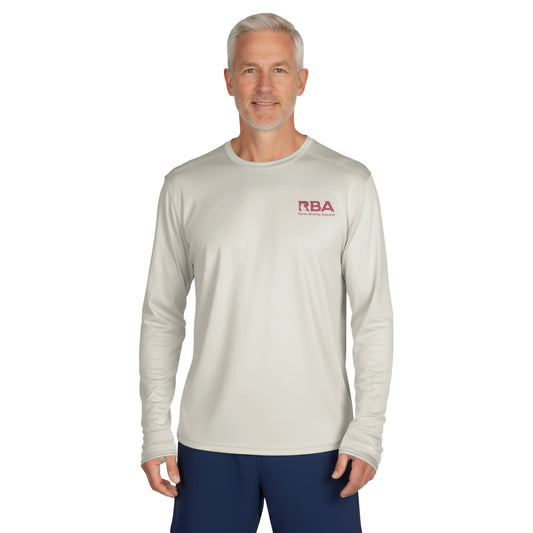 Man wearing a Desert Sand long sleeve solar shirt with RBA logo on the chest.