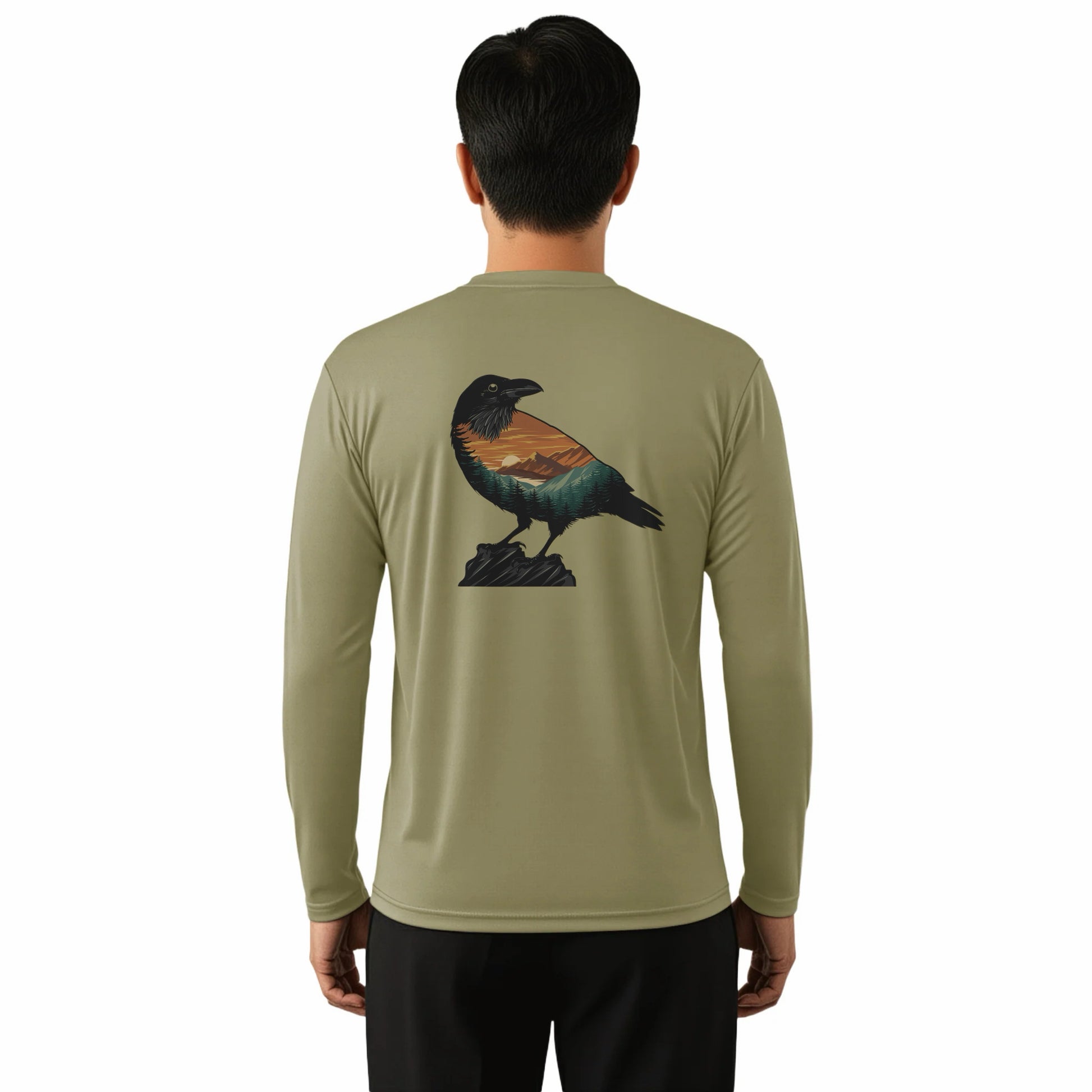 Person wearing a long-sleeve shirt with a bird design on the back, standing against a white background.