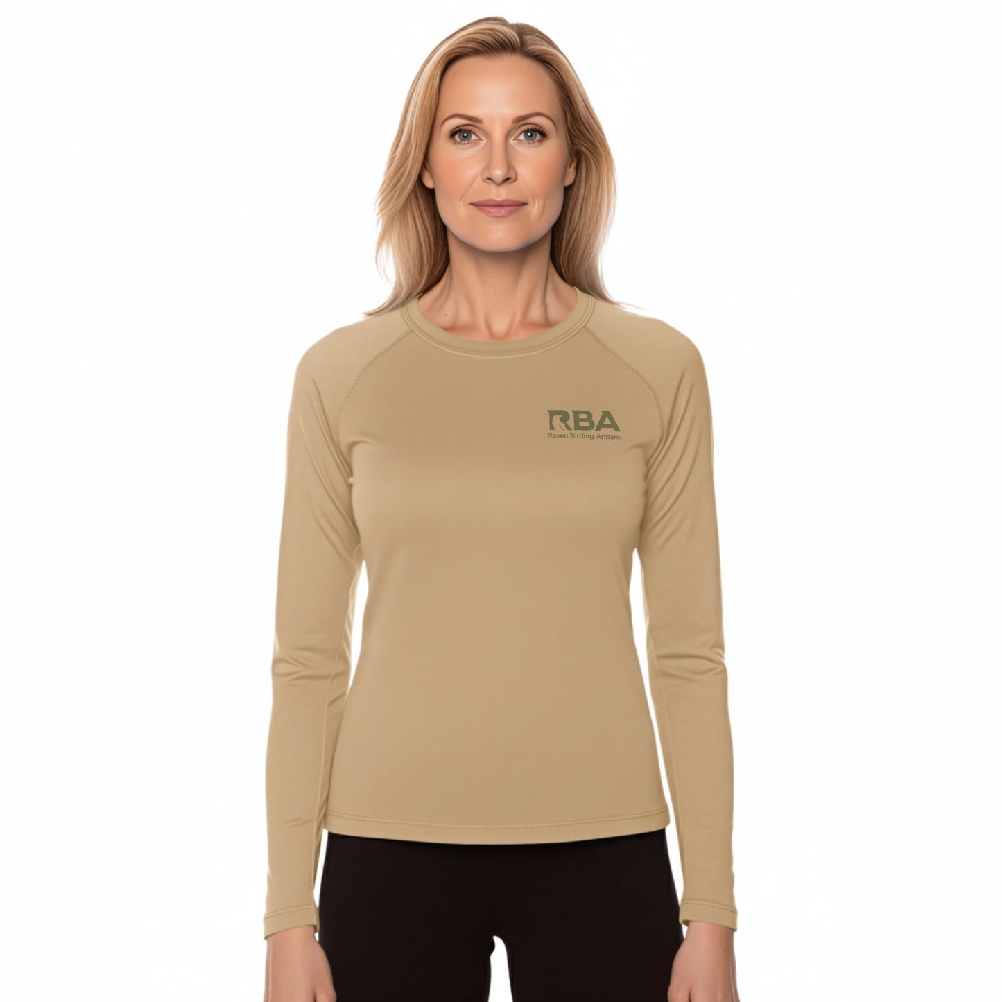 Woman wearing a beige long-sleeve shirt with 'RBA' logo on a white background