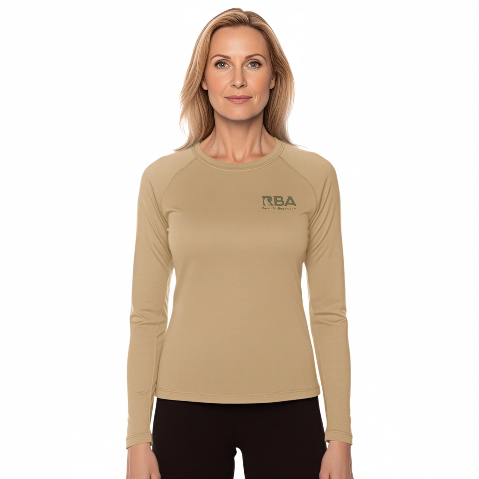 Woman wearing a beige long-sleeve shirt with 'RBA' logo on a white background