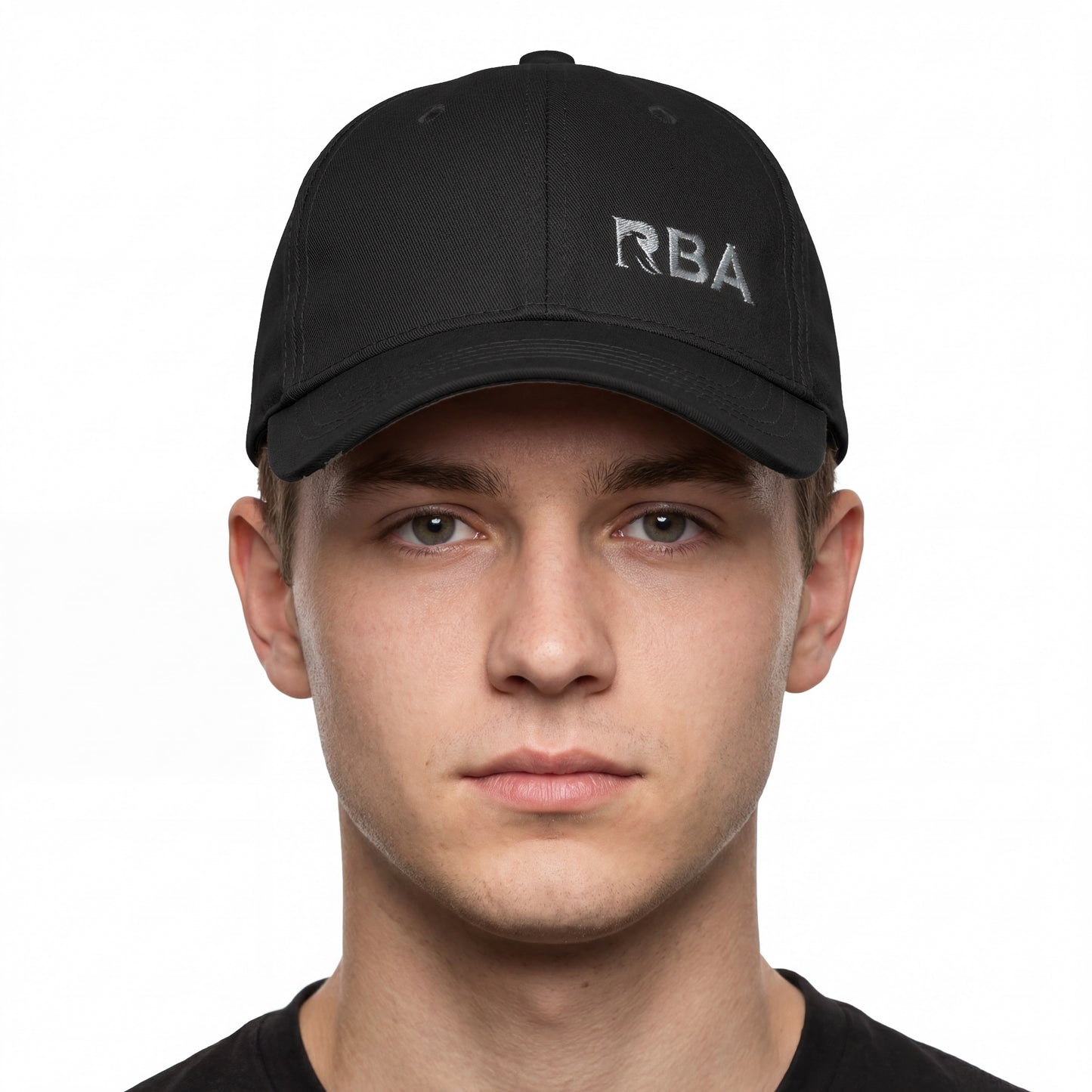 Person wearing a black cap with 'RBA' logo on a white background